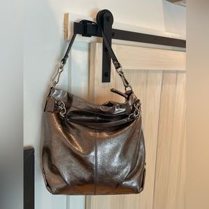 Coach signature metallic rose gold leather handbag